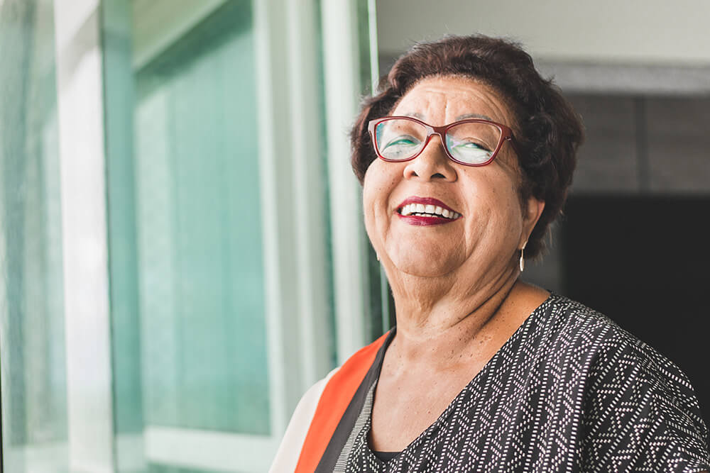 Woman outdoors smiling at the camera